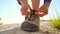 Hiking shoes - woman tying shoe laces