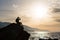 Hiking silhouette backpacker, man looking at ocean