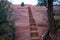 Hiking steps carved into a staircase in a steep rock, in Red Rocks open space in Colorado Springs