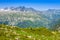 Hiking to Argentiere glacier with the view on the massif des Aiguilles Rouges in French Alps