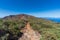 Hiking track with astronomical observatories on top of the mountain