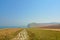 Hiking trail along a field toward the cliffs of Cap gris nez on the French North sea coast,