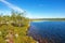 Hiking trail by a lake on a mountain heath