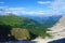 Hiking trail leading around peaks of picturesque Seceda Alpine meadows during summer, Ortisei, Dolomites, Northern Italy, Tyrol