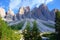 Hiking trail leading around peaks of picturesque Seceda Alpine meadows during summer, Ortisei, Dolomites, Northern Italy, Tyrol