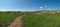 Hiking trail among Mediterranean hills in spring