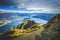 Hiking trail on mountain above lake landscape, scenic hike view over lake wanaka in new zealand, roys peak