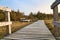 Hiking trail over a wooden walkway to the high dune on the DarÃŸ. National park