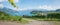 Hiking trail through rebberg vineyard, view to lake thun and spiez castle. scenic landscape, switzerland