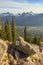 Hiking Trail Sign and Distant Snowcapped Rocky Mountain Peaks