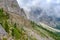 Hiking trail on a slope in a extreme mountains terrain