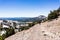 Hiking trail to Lassen Peak, Lake Helen in the background; Lassen Volcanic National Park, Northern California