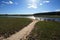 Hiking trail to Maidens Grave Hot Spring flowing into the Firehole River in Yellowstone National Park in Wyoming USA