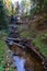 Hiking trail to Munising Falls waterfall in Pictured Rocks National Lakeshore during fall season