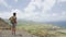 Hiking travel woman looking at St Kitts landscape - tourist destination