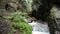 Hiking through the Wolfsklamm gorge on stairs. European Alps. Part of Karwendel mountains