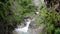 Hiking through the Wolfsklamm gorge on stairs. European Alps. Part of Karwendel mountains