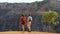 Hiking woman and man walking on hike in Waimea Canyon