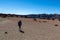 Hiking woman with scenic view on moon landscape of Minas de San Jose Sur near volcano Pico del Teide,  Tenerife.