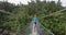 Hiking woman tramping in New Zealand Abel Tasman National Park