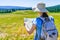 Hiking woman traveler with backpack