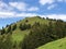 Hill Bruschstockbugel Brueschstockbuegel above alpine Lake Wagitalersee or Waegitalersee, Innerthal