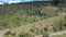 Hill with Highway Power Lines and Fields Upper View