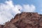 Hill with Jordanian flag in Petra.