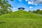 Hill with meadow, on which a staircase leads up to a monument to the flight pioneer Otto Lilienthal