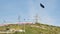 A hill in a park in Tehran designed with different flags