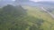 Hill ranges covered with grey fog against boundless valley