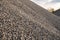 A hill of Sea stones background, Ground stone grey background of many small stones, Gravel texture. Small stones, little rocks,