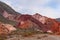 Hill of seven colors, Purmamarca, Argentina, mountain range with colorful purple and orange colors