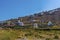 A hill side of traditional windmills on the outskirts of the village of Oia, Santorini