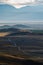 Hills and field road in the Kurai steppe at sunrise