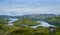 Hills, islands and lake water nordic landscape.