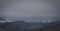 Hills on Jahorina, Bosnia, covered with snow fading into the distance. White snowy hills with trees