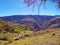 Hills of open countryside to the mountains