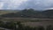 Hills with a valley and the clouds