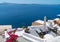 Hillside homes and buildings in whitewashed traditional Greek Island style