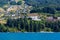 Hillside houses on the shore of lake Wakatipu, in Queenstown, Otago, New Zealand