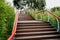 Hillside planked stairway in cloudy summer after rain