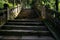 Hillside shady steps with balustrades on sunny day