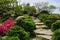 Hillside stone steps in sunny flowering spring