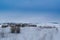 Hilltop full of snow empty sheepfold