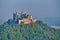 Hilltop Hohenzollern Castle on mountain top in Germany