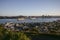Hilltop vista of seaside suburb, coastal cityscape of cbd and port from grassy Mount Victoria, Devonport, Auckland, New Zealand