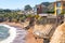 Hilltop vistas and stairs to climb down. The stairs are easily accessible points to reach the beach and sandy coves. Shell Beach,