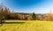 Hilly landscape above Turzovka town in Slovakia with meadows, hills, forest devastated by bark beetle and dispersed settlement