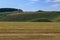 The hilly nature of Eastern Europe. Green mounds with selective focus. Landscape background